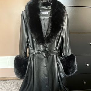 Black Faux leather and fur jacket with detachable fur and round black buttons!